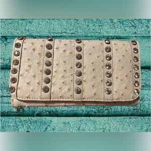 Silverake white faux ostrich, skin women’s wallet. With jeweled embellishments